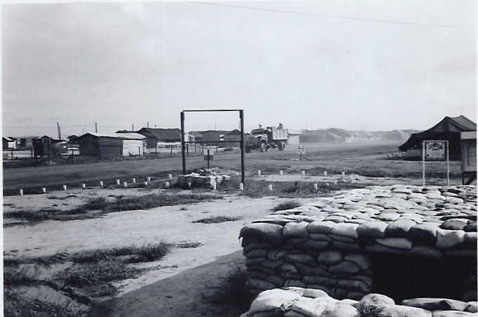Looking out Class I hutch bunker, bullentin board & vietnamese truck