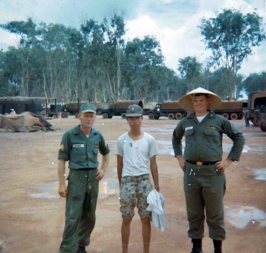 SGT Sevigne, a civilian, and 2LT Parker - Aug 1966