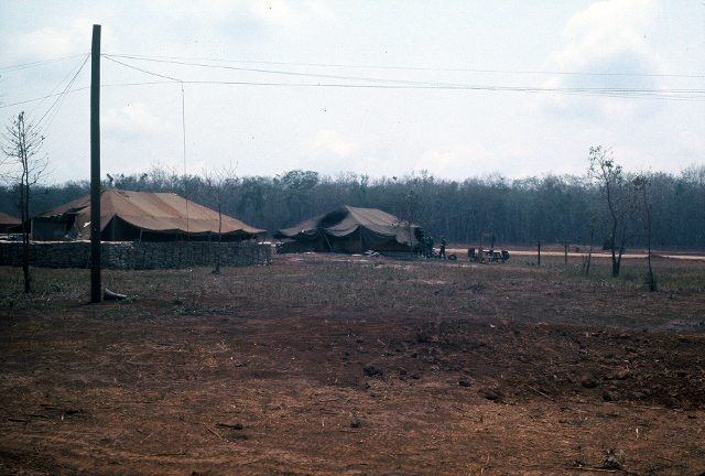 Xuan Loc - morning after mortar attack - tent behind mine hit - NCO killed (640x432)