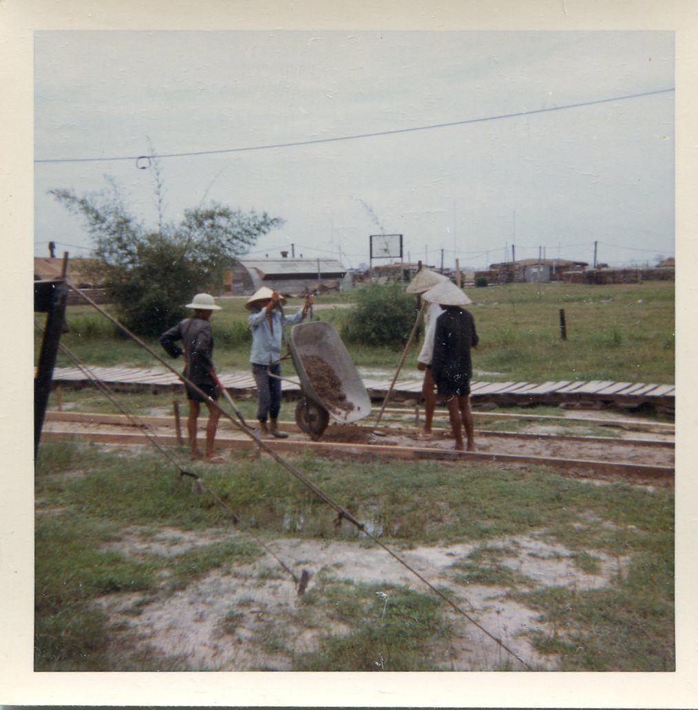 Locals Pouring Concrete Sidewalk in 25th S&T Area, Cu Chi