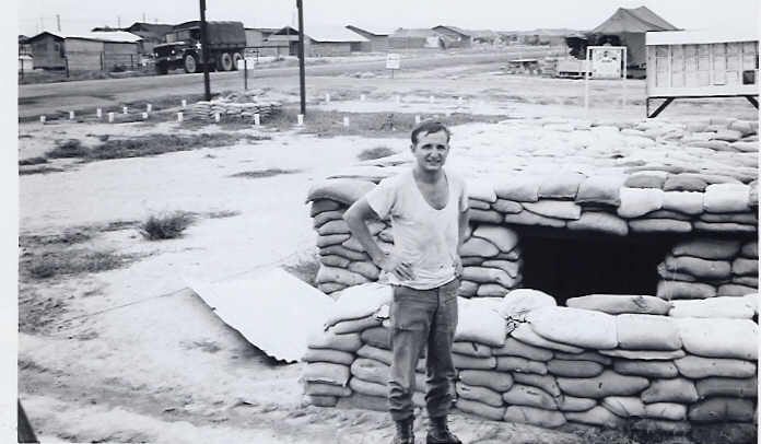 sp 4 Simonenko outside hutch in front of bunker